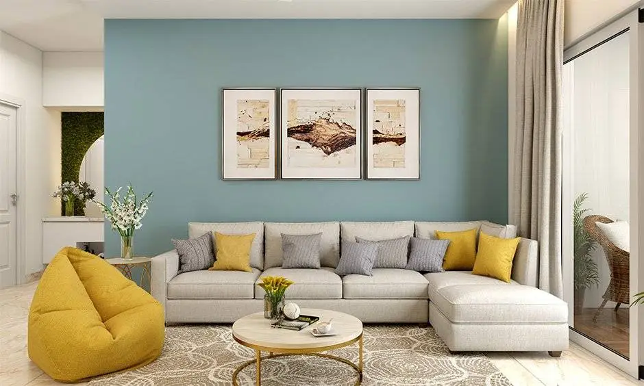 Living room with a soft blue accent wall with smooth matte finish and crisp white trim by an interior painter in McHenry County, IL.