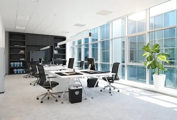 Office interior with light neutral walls and dark accent walls by an interior painter in Kenosha County, WI.