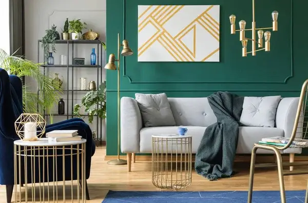 Living room with deep teal green accent wall and a satin finish by a house painter in McHenry County, IL.